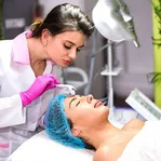 Client receiving a facial treatment at a skin clinic